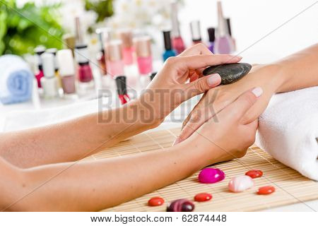 Close up of process of hand massage at beauty salon