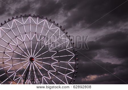 Ferris Wheel Against The Dark Sky