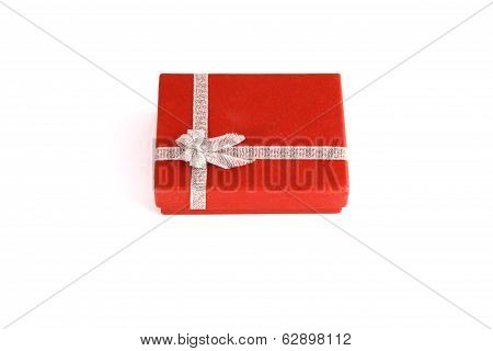 Silver Color Bow Ribbon On Red Background