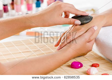Close up of process of hand massage at beauty salon