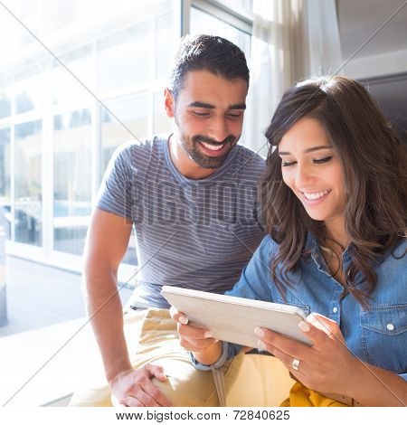 Couple Using Tablet
