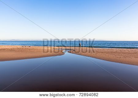 Fisherman At Bolonia Beach