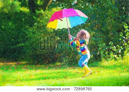 Happy Little Girl With Umbrella