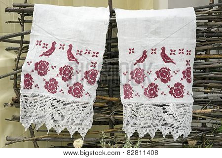 Towel With Embroidery Hanging On The Fence
