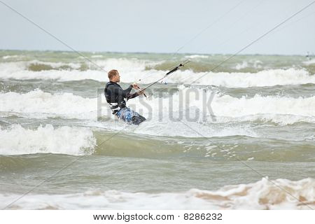 Kiteboarder surf