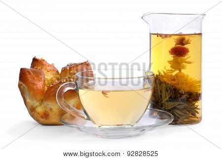 Floral tea and a bun