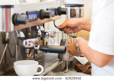 Prepares espresso in coffee shop