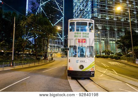 HONG KONG - JUNE 03, 2015: double-decker tram on street of HK. Hong Kong Tramways is a tram system in Hong Kong, being one of the earliest forms of public transport in the metropolis.