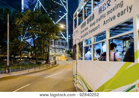 HONG KONG - JUNE 03, 2015: double-decker tram on street of HK. Hong Kong Tramways is a tram system in Hong Kong, being one of the earliest forms of public transport in the metropolis.
