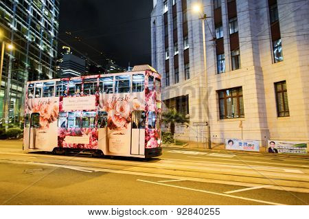 HONG KONG - JUNE 03, 2015: double-decker tram on street of HK. Hong Kong Tramways is a tram system in Hong Kong, being one of the earliest forms of public transport in the metropolis.
