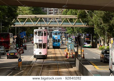 HONG KONG - JUNE 03, 2015: double-decker tram on street of HK. Hong Kong Tramways is a tram system in Hong Kong, being one of the earliest forms of public transport in the metropolis.