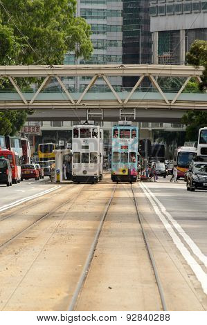HONG KONG - JUNE 03, 2015: double-decker tram on street of HK. Hong Kong Tramways is a tram system in Hong Kong, being one of the earliest forms of public transport in the metropolis.