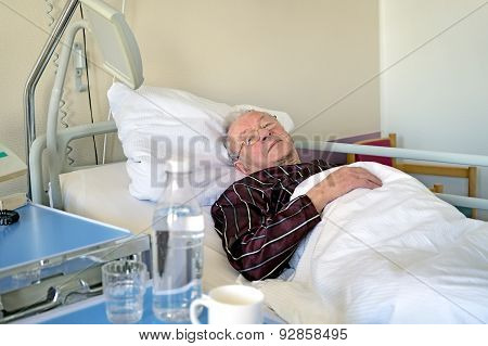 Elderly Man Recuperating In A Hospital