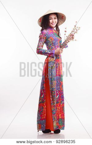 Beautiful Vietnamese Woman With Tradition Ao Dai With Modern Design And Palm-leaf Conical Hat ( Non