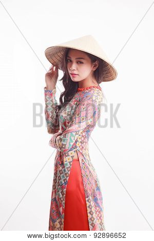 Beautiful Vietnamese Young Woman With Modern Style Ao Dai And Palm-leaf Conical Hat ( Non La ) On Wh