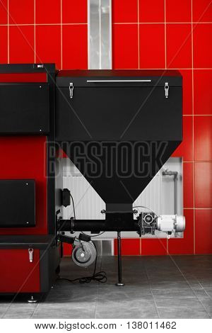 Solid-fuel boiler in the boiler room