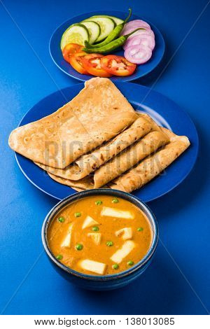 paneer butter masala with chapati / roti / paratha / fulka / indian bread and green salad