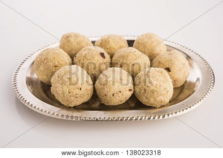 Indian favourite sweet coconut laddu or laddoo or nariyal ladu