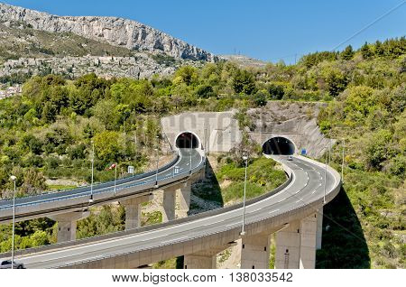 croatian motorway with curved viaducts and tunnel entrance near klis dalmatia croatia