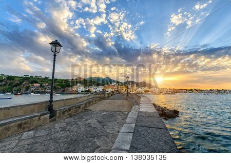 Evening cityscape of Ischia at sunset town in the Metropolitan City of Naples Italy