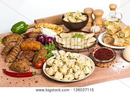 a lot of different dishes on the holiday table