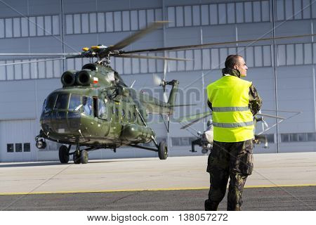 Ostrava, Czech Republic - September 22: Man In Military Uniform Stands In Front Of Polish Mi-8T Heli
