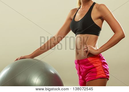 Woman Doing Fitness Exercises With Fit Ball