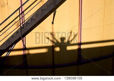 People Shadows On Old Metal Tanks In Power Plant,