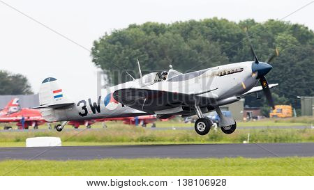 Leeuwarden, The Netherlands - June 10, 2016: A Vintage Spitfire Fighter Plane Makes A Low Flypast Fo