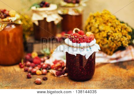 Homemade Strawberry Pits. Dessert Made Of Must And Flour Placed Inside Small Jars. Homemade Raspberr