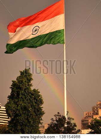 Rainbow adding colors to the Indian flag in Connaught Place, New Delhi- India