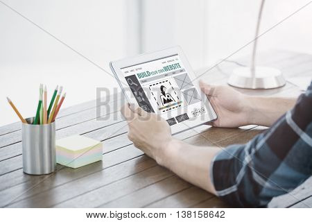 Composite image of build website interface against close up of hands using a tablet computer Close up of hands using a tablet computer on the modern desk