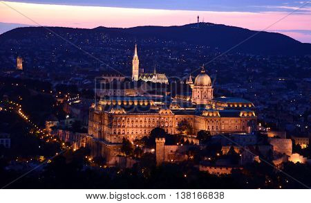 Buda castle night view, Harmashatarhegy Mountain in the background (Budapest, Hungary)