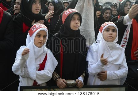 Istanbul Turkey - November 3 2014: Universal Ashura Mourning Ceremony. Day of Ashura. A Universal Ashura Mourn Ceremony was held in Istanbul to commemorate the martyrdom of Husain ibn Ali the grandson of the Prophet Muhammad and his 71 friends.