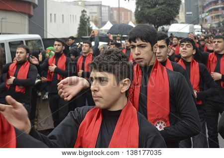 Istanbul Turkey - November 13 2013: The global mourning ceremony of Ashura. Azerbaijan Hz. Imam Hussain Group. Karbala Martyrs Commemoration in Arenamega. Thousands of Jaferies in Turkey joined the Karbala mourning ritual where Prophet Muhammad's grandson