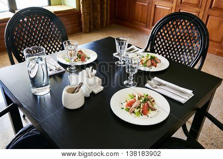 Serving Dinner Table For Three People At Cafe