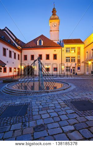 Old town hall of Uherske Hradiste as seen from its yard early in the morning.