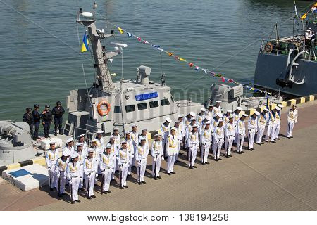 Odesa, Ukraine - July 03, 2016: sailors on the background of the new armored boats during the ship naming ceremony.