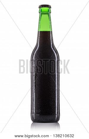 Bottle of dark beer with drops in green bottle isolated on white background.