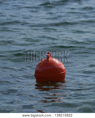 Red Buoy In Milada Sea In Hot Summer