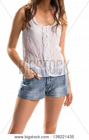 Woman in white blouse. Sleeveless top and short shorts. Light apparel for summer. Model wears cotton clothing.