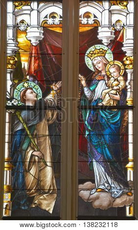 SAVANNAH GEORGIA JUNE 28 2016: Stained glass window at The Cathedral of St. John the Baptist is a Roman Catholic cathedral. It is the Mother Church of the Roman Catholic Diocese of Savannah.
