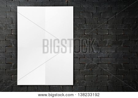 Blank Folded Paper Poster Hanging On Black Brick Wall,template Mock Up For Adding Your Design