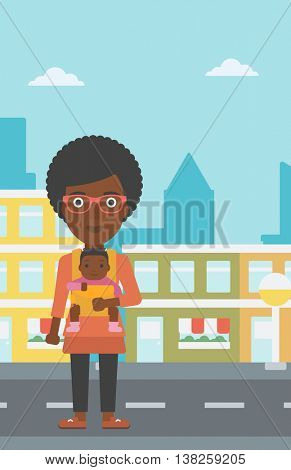 An african-american mother carrying son in sling. Mother with baby in sling walking in the city street. Young mother carrying a newborn in sling. Vector flat design illustration. Vertical layout.
