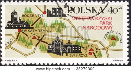 MOSCOW RUSSIA - JANUARY 2016: a post stamp printed in POLAND shows a map of Swietokrzyski National Park - Larch Polonica the series 
