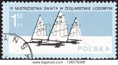 MOSCOW RUSSIA - JANUARY 2016: a post stamp printed in POLAND shows competition of yachts the series 