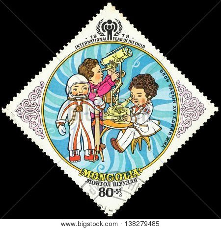 MONGOLIA - CIRCA 1979: a post stamp printed in MONGOLIA shows playing children the series "International Year of the Child" circa 1979