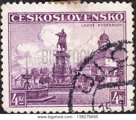 MOSCOW RUSSIA - JANUARY 2016: a post stamp printed in CZECHOSLOVAKIA shows the castle and equestrian statue in Podebrady the series 