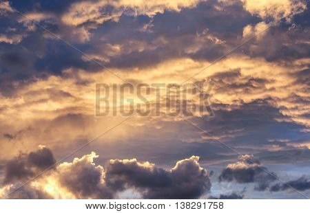 Clouds lit from below.
Clouds in the sky during the day and evening.