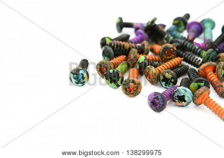 Abstract Of Crosshead Screws, Covered In Paint Splatters